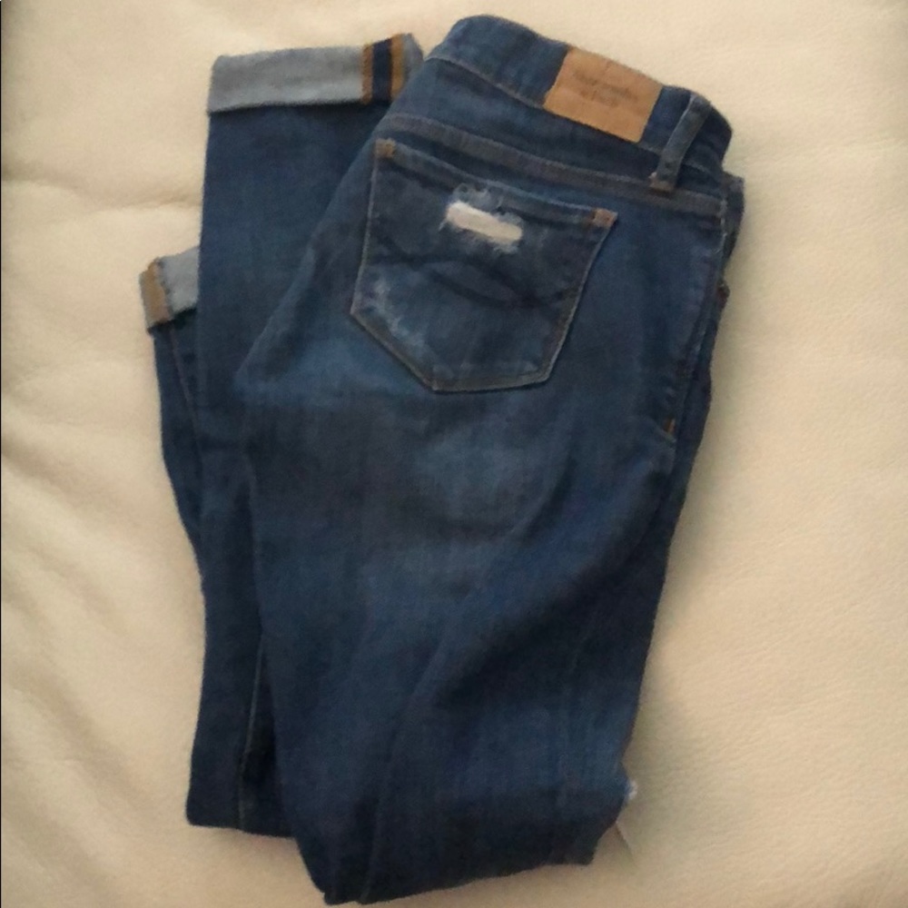 Dark blue destroyed jeans